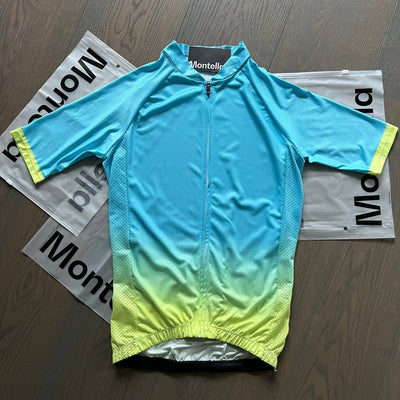 Jersey de ciclismo de gradiente azul de las mujeres